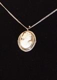 Cameo set in sterling silver, with sterling silver chain. Chain is broken.