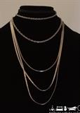 Napier and Trifari silver-tone chains.
