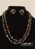 Vendome double strand black/brown/iridescent glass bead necklace with matching clip earrings.