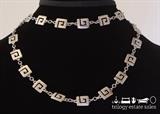 Trifari silver-tone Greek Key necklace. 36". Trifari "T" with crown charm attached to clasp.