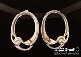 Givenchy silver tone post back earrings. 1.5" long, 1" wide. 