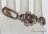 Reisler silver-tone bracelet. 7"