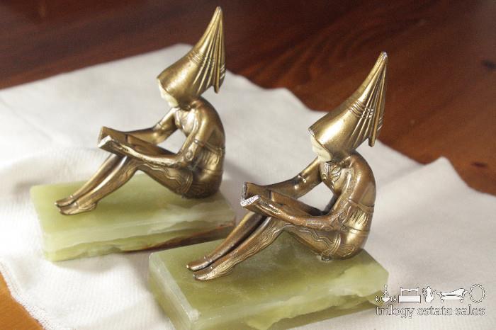 Bronze on marble base bookends with Ivorine. These bookends were Produced by J.B. Hirsch in 1927 from the original French mold by Austrian Costume Designer and Sculptor, Gerda Iro Gerdago.