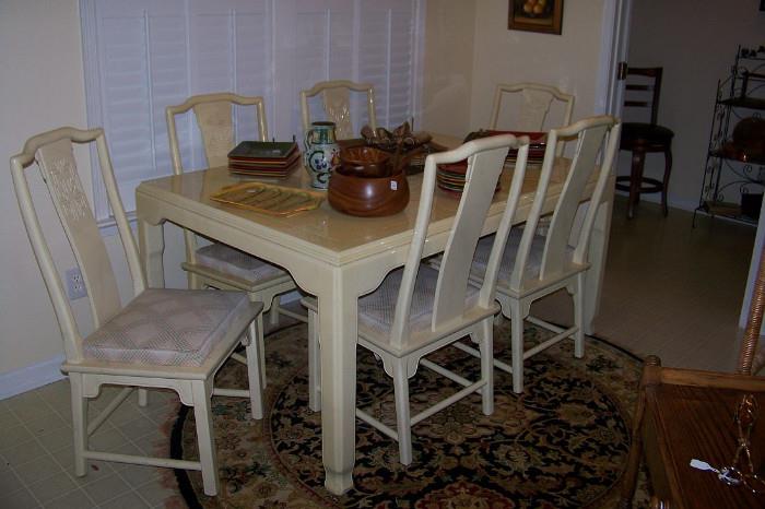 Mid century table and 6 chairs (with two additional leaves) - has an oriental flare
