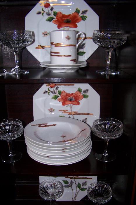 The china is by Fitz and Floyd - a service for 6.  THe pattern is: "Fleur et Nuages"