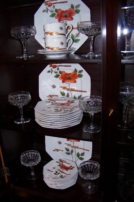 Set includes dinner plates, salad plates, bread and butter, cups and saucers
