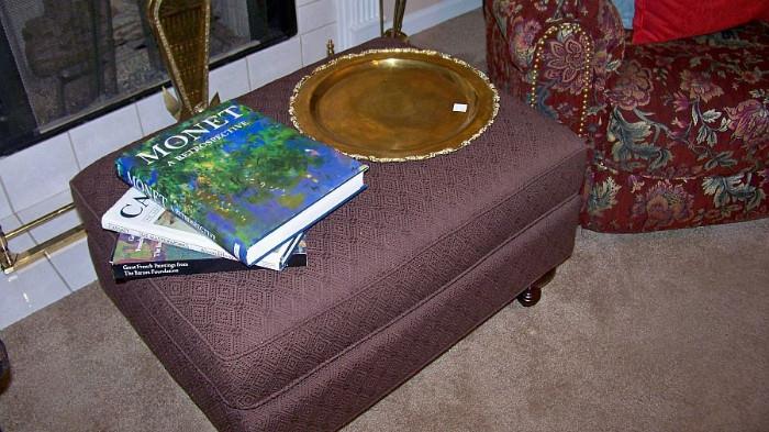 This footstool goes with a large chair in another room