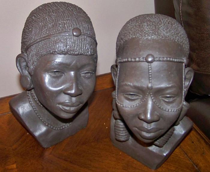 These two figures were p urchased from the Sarang Art Gallery in Nairobi, Kenya.  They are by artist Yuko Miyare from the Luo tribe.  They are wonderfully constructed of clay.  