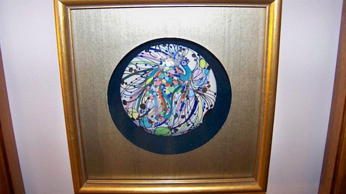 There are three of these framed - each is signed by the signature is on the very edge of each of the glass and is hard to read.  They have the look of Murano glass- very pretty and unusual pieces