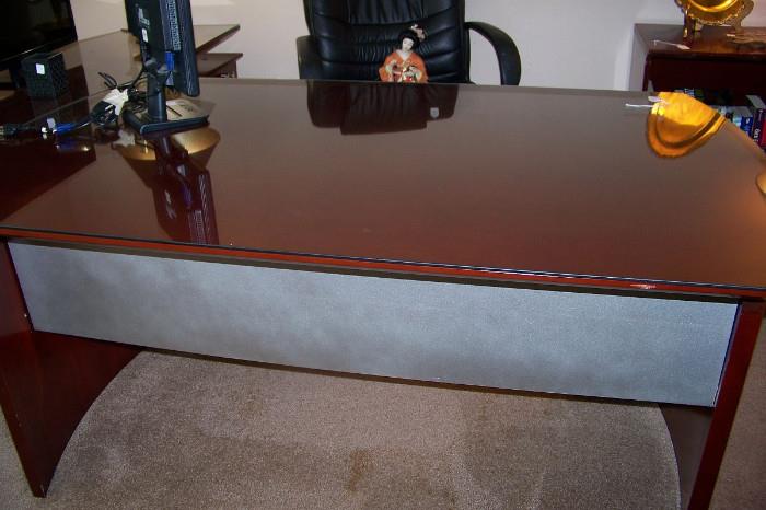 front of the desk - very sleek and modern with chrome highlights