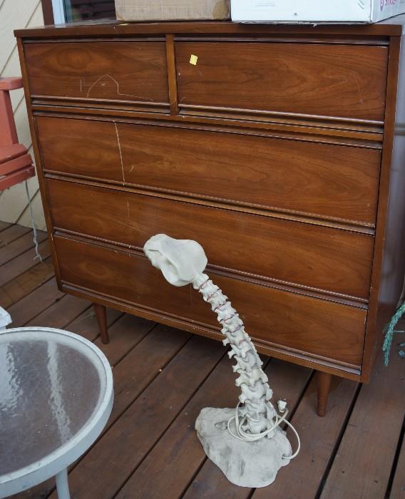 Dixie chest of drawers and a skeletal lamp