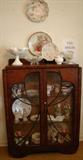 Small scale Art Nouveau type china cabinet is just right for many rooms in your home.