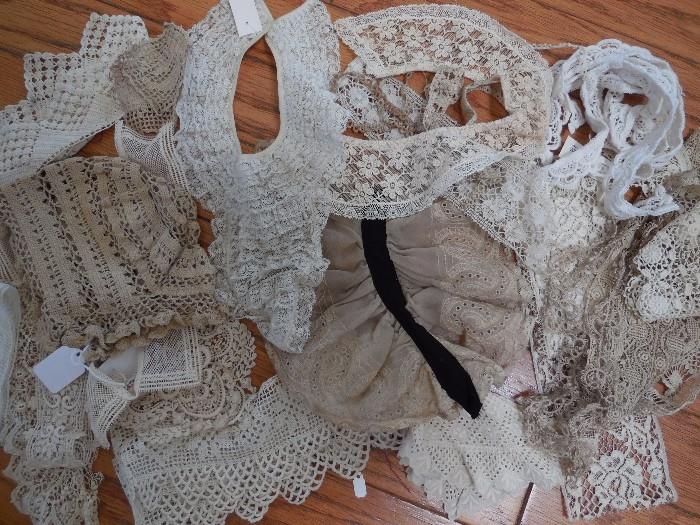 Sample of lace pieces. Handmade bonnet (left) several Victorian/Edwardian collars, lace cuffs, trims and more