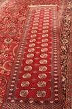 Vintage 10' x 2 1/2' hand-knotted Bokhara runner rug.