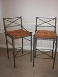 2 tall verde metal bar stools with upholstered cushion seats 