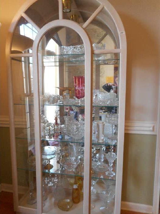 Lots of wonderful cut glass and pretty curio cabinet