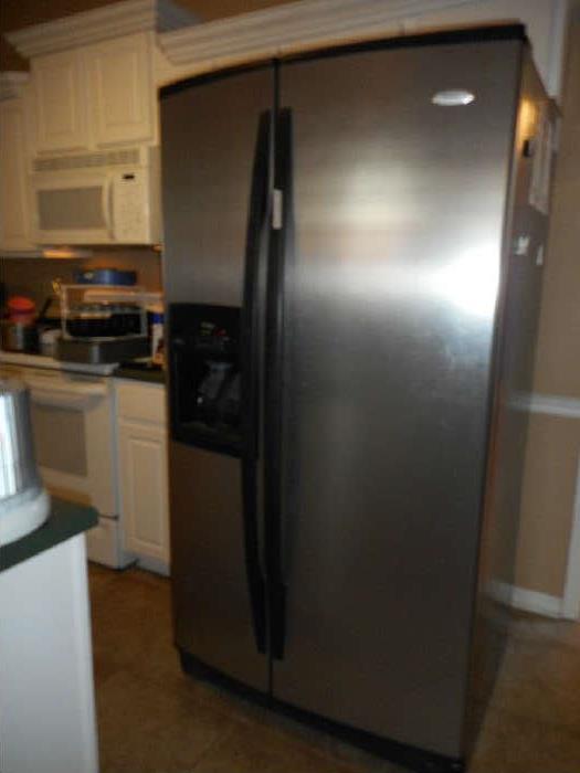 Stainless side by side refrigerator, clean