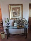 glass top console table, newer Tiffany lamp, "Muse II" print by Dennis Grey