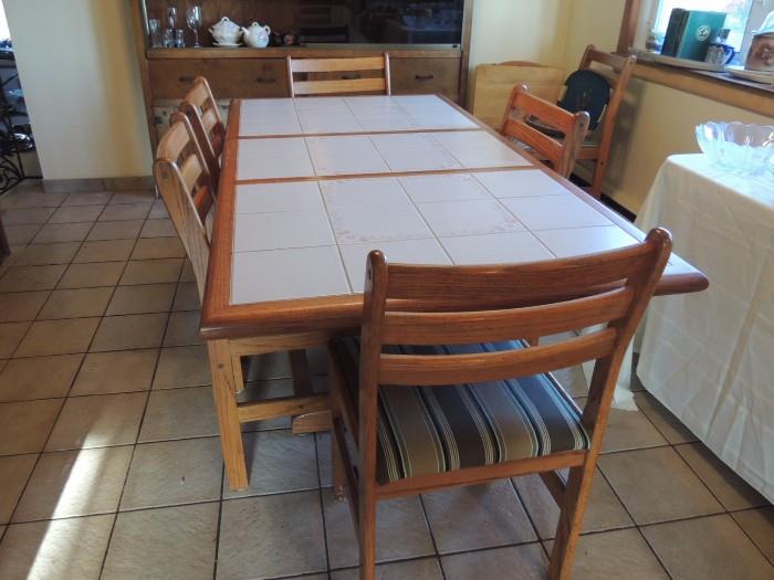 tile top kitchen table with six chairs