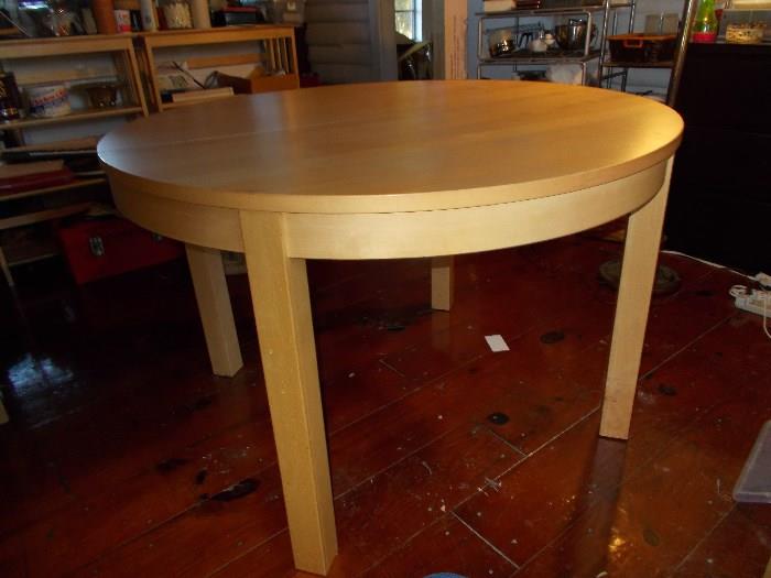Round Wooden Table - Blonde Wood - 29.5" Tall; 45.5 across...no markings...looks like something from IKEA or Crate & Barrel  -  GREAT condition!!  UPDATE: Just discovered that there is a "convertible" leaf in  the center of the table (underneath) will take a photo and post - becomes an oval table...65 inches long!!!!!!!