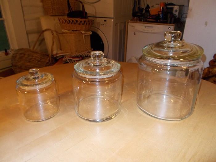 3 Glass Containers with Lids - like the old "Tom's" Candy/Cracker Jars - no writing on them - will be sold separately... Left to Right: 6"; 8"; 10"