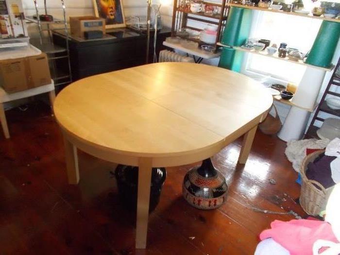 This is how the table (seen in an earlier photo) looks with the leaf installed - stretch the table out - leaf is inside - you can "pop it up"...lower it when you don't need the size - 65" long...REALLY NICE!!!!!!