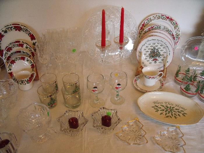 Lenox candlesticks with candles.  Lenox oval plate and Mikasa glass items