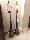 pair of tall brass lamps