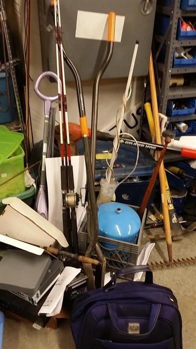 Fishing rods and assorted garage items.