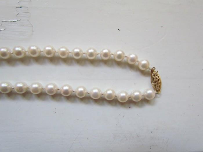 Salt water AA quality pink pearls with 14k filigree clasp 