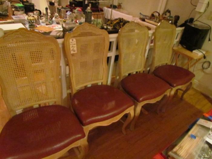 Set of four leather covered chairs