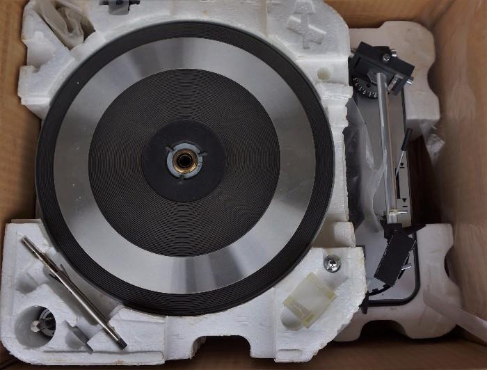 Dual 1019 turntable. They boxed it in the original boxes when moving.