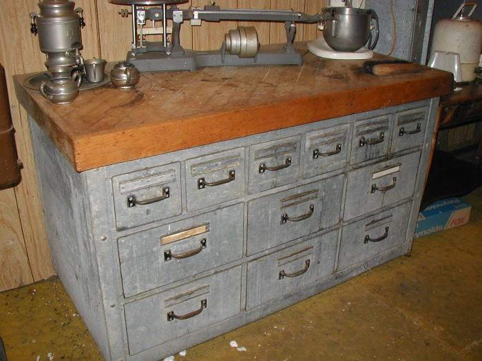 Vintage Baking Cabinet - approx. 2 feet by 5 feet Made of galvanized metal - all the drawers have covers and slide nicely - would make a fantastic island