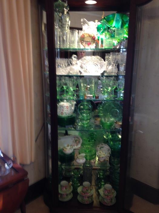 Beautiful Lighed Cabinet filled with Green Depression Glass, Vaseline glass, cut and pressed glass, vintage crystal