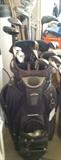 3 Callaway woods, Snake Eye irons, no putter.