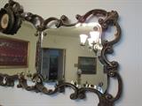 long ornate beveled mirror