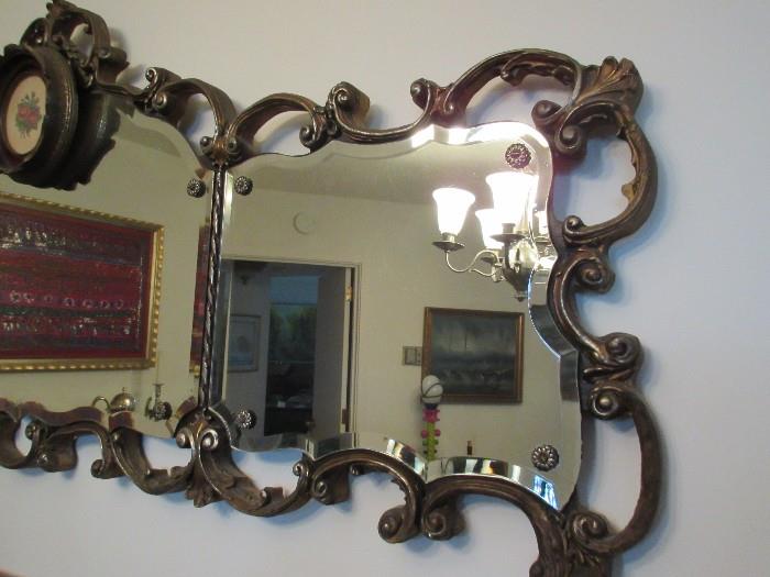 long ornate beveled mirror