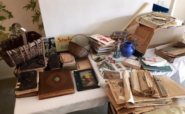 old paper, postcards and newspaper clippings and magazines, Roseville and hull plus antique baskets