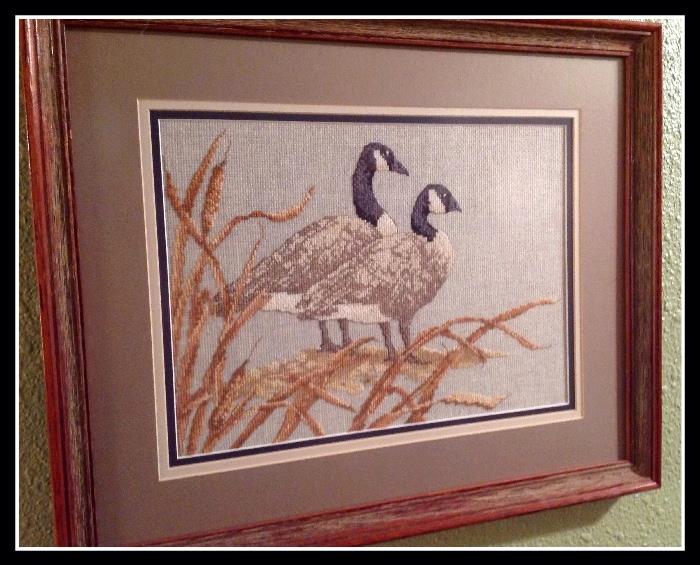 One of many pictures in the home that have been hand stitched: cross stitched 