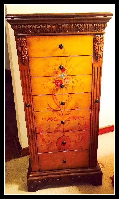 Tall jewelry armoire with drawers and that opens up for necklace storage as well. 