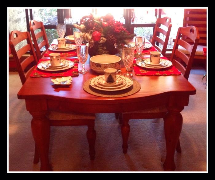 Broyhill dining room table with six chairs and extra leaves. 