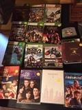 tons of video games and DVDs