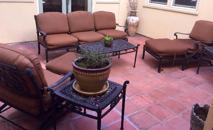 Fantastic outdoor set, couch two chairs and ottomans and coffee table and end tables! Beautiful condition!