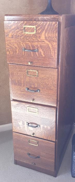 Antique quarter sewn oak file cabinet