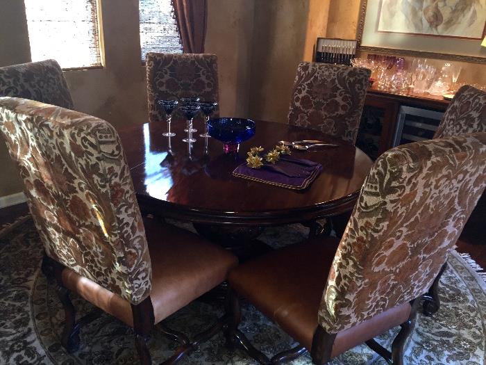 Beautiful Marge Carson round dining table for 6 with leather chairs.  Used 2 times!