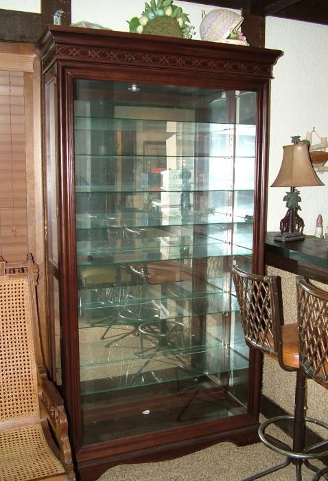 Cherry Lighted display cabinet with 8 glass shelves, very nice