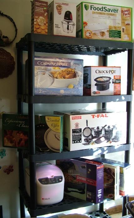 Lots of cookware in orig boxes, would make great gifts this time of year