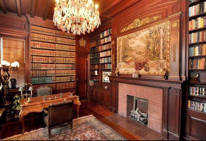 Library - walls of law books, French style writing desk with ormolu, pair of bronze torcheres with figures of ladies, scenic tapestry