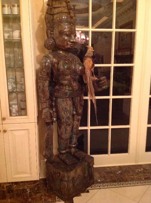 One of a pair of antique life size Indian statues 