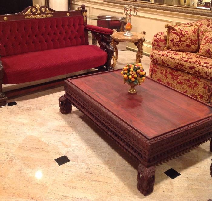 Antique French Empire sofa with full griffin supports and ormolu, one of a pair of gold and red damask loveseats, fine large carved wood Indian coffee table